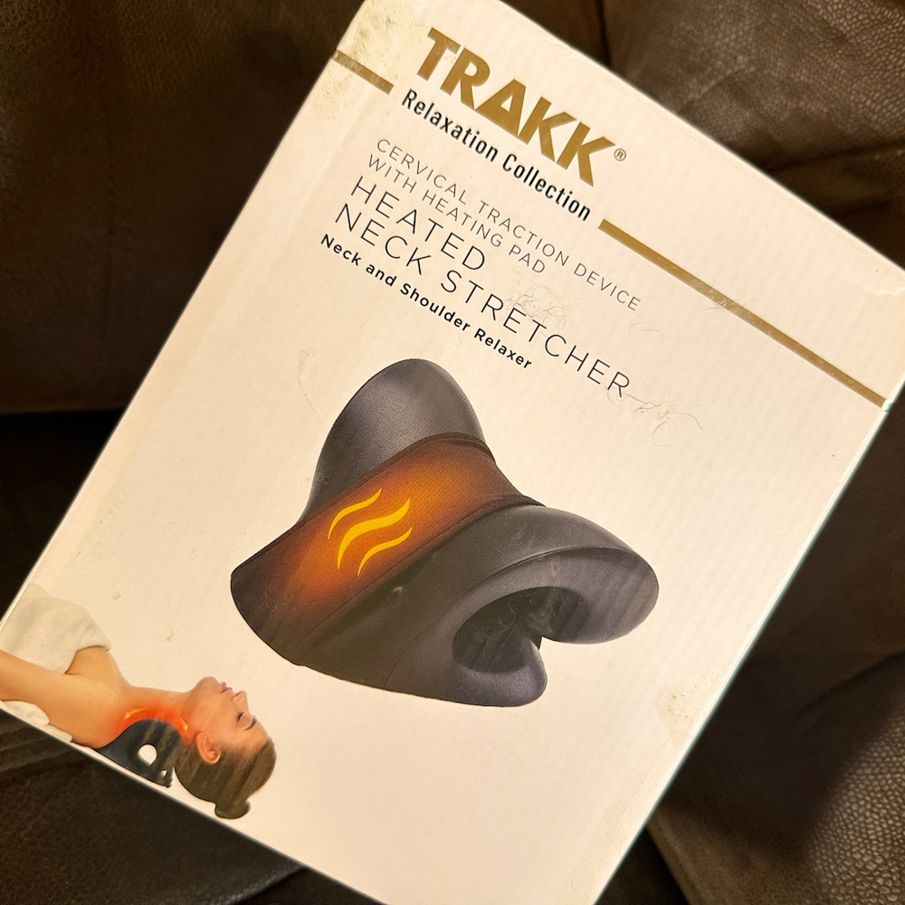 BRAND NEW! Never EVER opened!  
TRAKK Heated Neck Stretcher